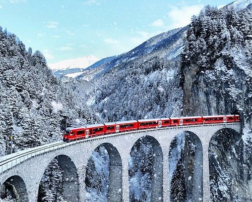 Majestic peaks of the Swiss Alps during a summer ascent.